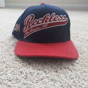 Young and Reckless trucker hat